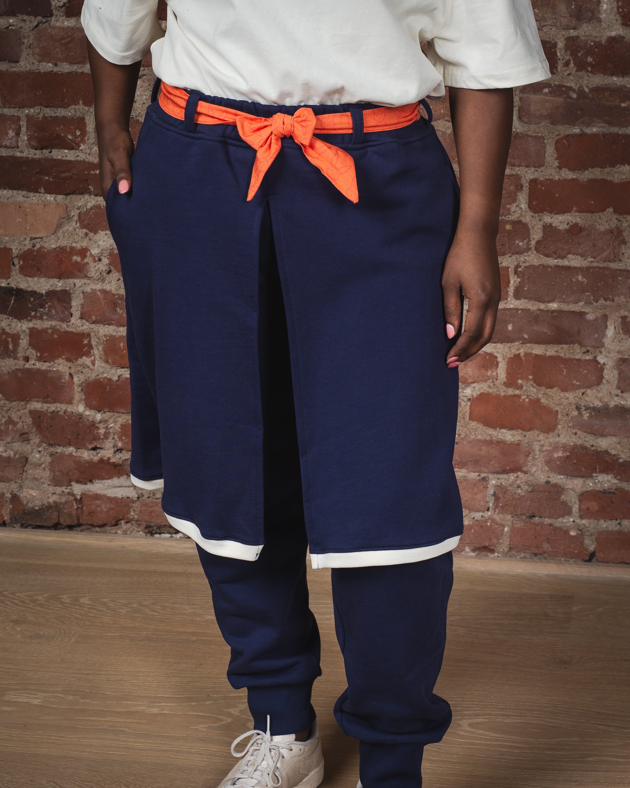SWEATPANTS WITH SKIRT LAYER AND CONTRAST DETAILS