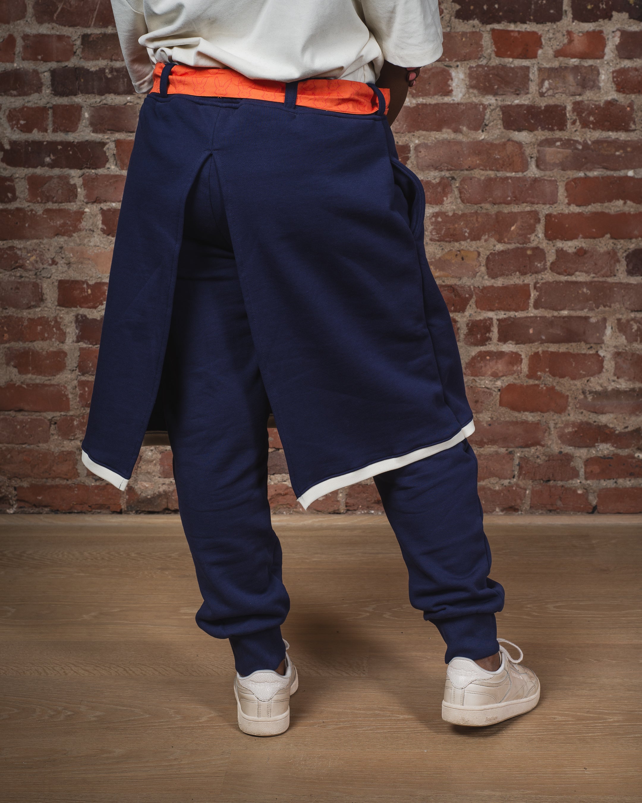 SWEATPANTS WITH SKIRT LAYER AND CONTRAST DETAILS