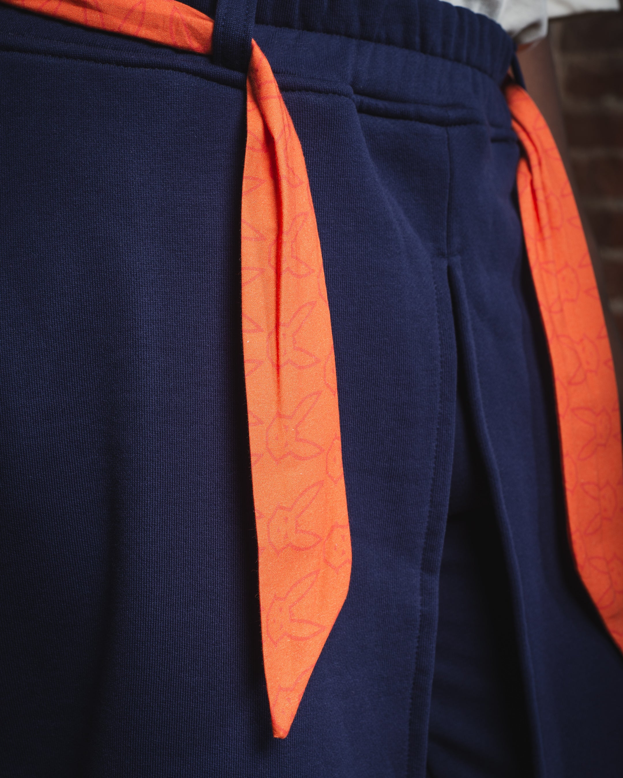 SWEATPANTS WITH SKIRT LAYER AND CONTRAST DETAILS